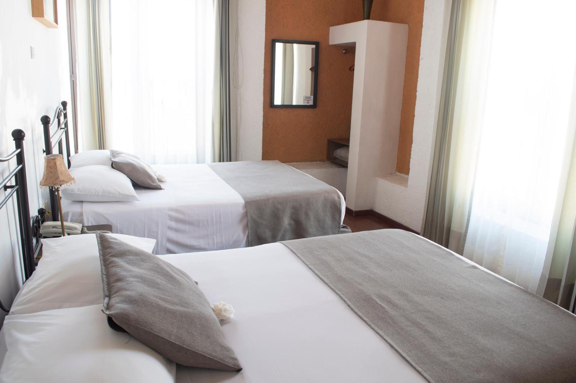 Portico Hotel & Galeria Morelia Pokoj fotografie